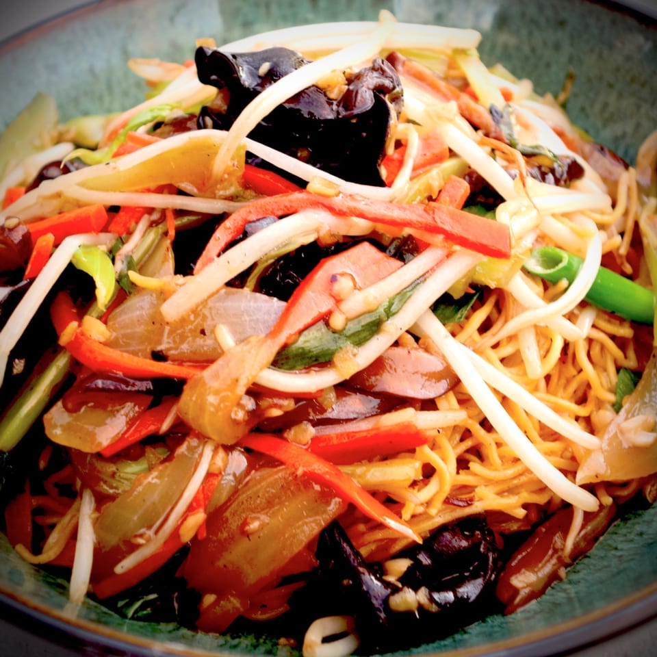 Close-up of Only Ono BBQ's Chinese chow mein with noodles, vegetables, and wood ear mushrooms.